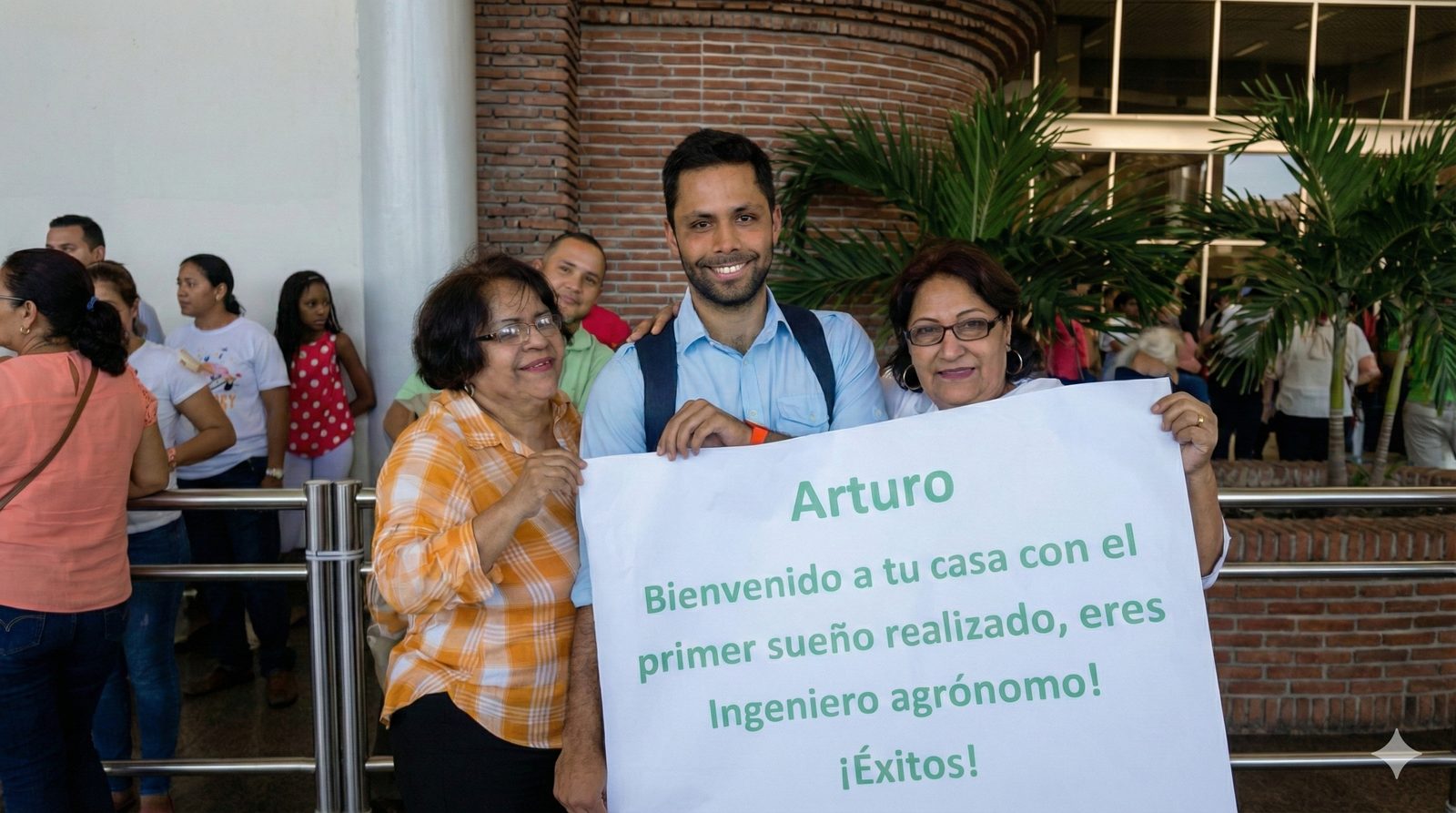 Llegada al aeropuerto: mi familia con un cartel que dice «Bienvenido a tu casa con el primer sueño realizado, eres ingeniero agrónomo»
